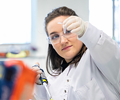 UCD student working in lab.